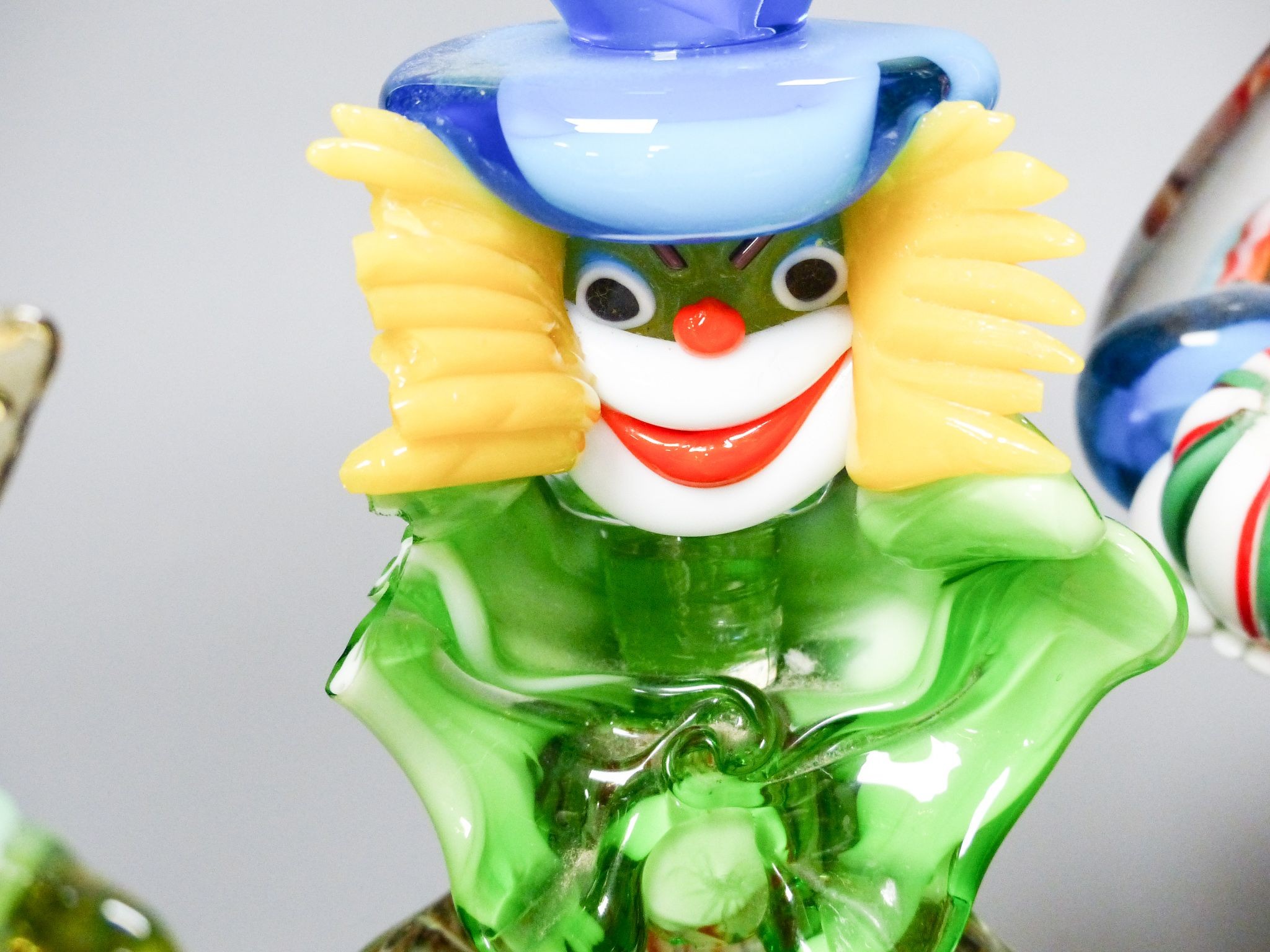 Three Murano glass figures of clowns and two similar figures of ladies, tallest 34 cm